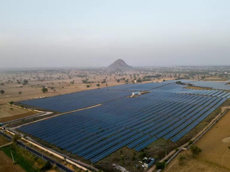 Solar arrays at a solar farm in Haryana, India, on April 22, 2026. 

India, which imports roughly 88 percent of its crude oil and had been steadily expanding purchases of discounted Iranian barrels before the conflict escalated, now faces mounting pressure to secure alternative supplies as tanker insurance costs and shipping routes through the Persian Gulf come under renewed strain.