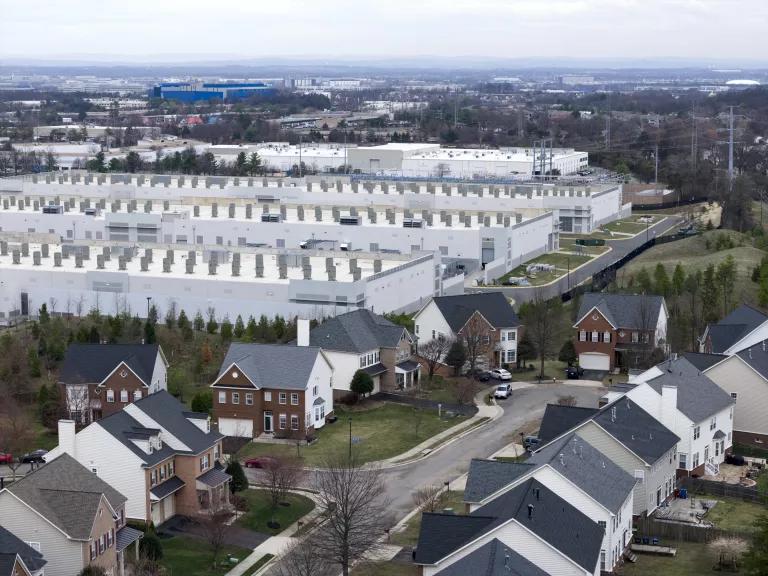 An Amazon data center located beside a residential neighborhood in Sterling, Virginia, on March 14, 2026. 

Data centers require large amounts of natural resources, including water, to run. Northern Virginia has the largest concentration of data centers in the world, managing roughly 70% of global internet traffic.