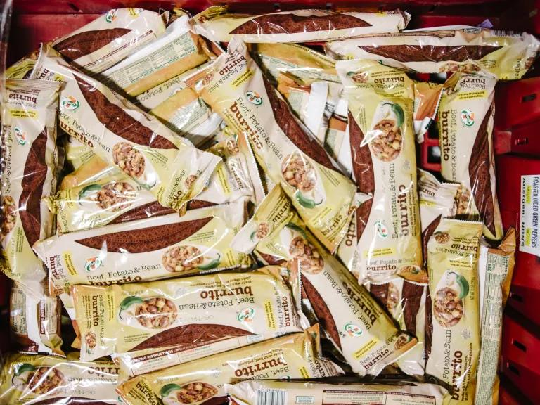 A carton of packaged burritos