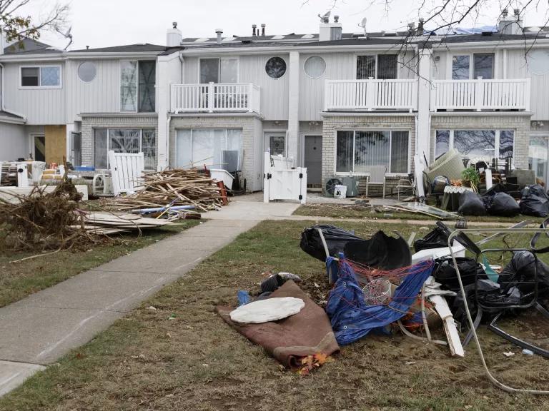 Debris piled outside homes that flooded during Hurricane Sandy in Staten Island, New York City.