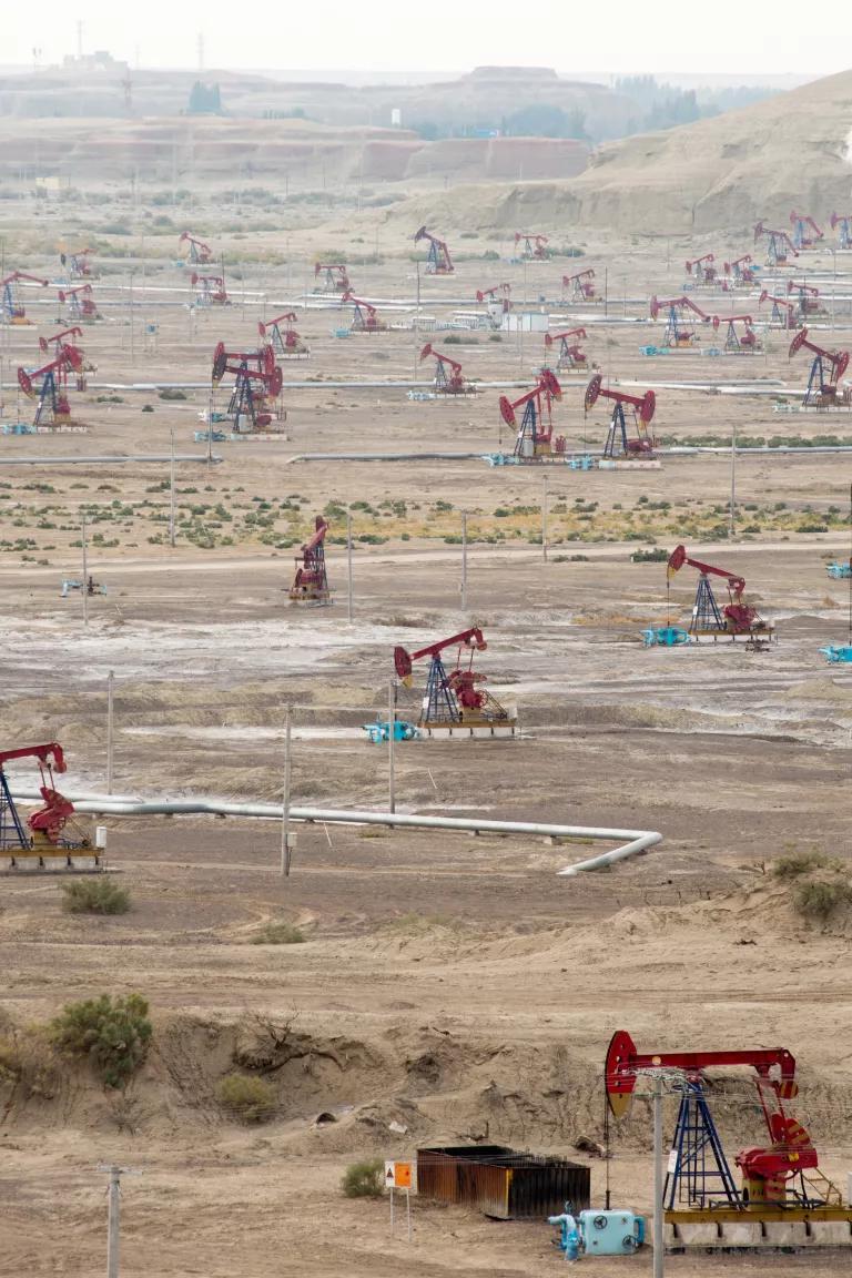 Brightly colored pumpjacks in a large oil field near Karamay in the Xinjiang Uyghur Autonomous Region, China