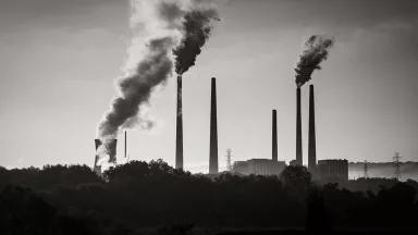 A black and white image of a coal-fired power plant