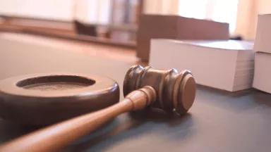 A gavel sits on a table