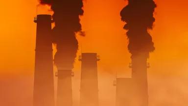 Smokestacks at sunset