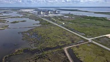 An aerial view of etlands near the Cameron liquefied natural gas export terminal located along the Calcasieu Channel in Hackberry, Louisiana