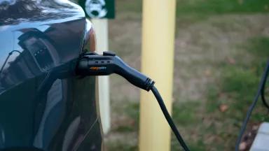 A car plugged in to charge at an electric vehicle charging station in Pennsylvania.