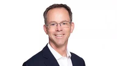 A headshot of Michael Wall