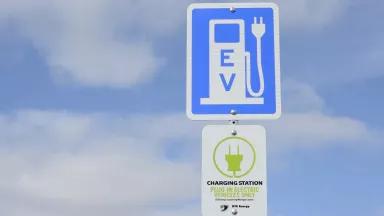 A sign at an outdoor charging station for electrical vehicles in downtown Rochester, Michigan.
