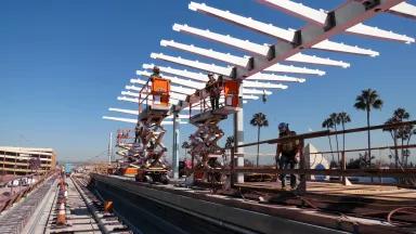 Construction workers build a station on the LA Metro Crenshaw Line.