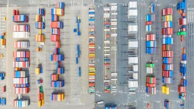 An overhead view of shipping containers stored in the Port of Oakland