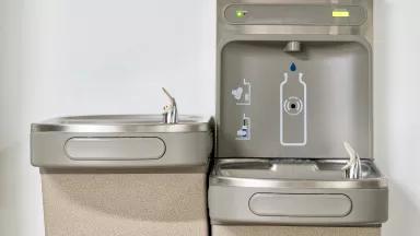 A filtered drinking water fountain with a bottle filling station.