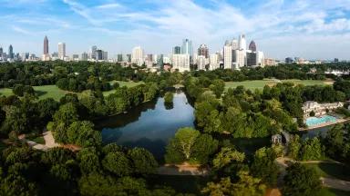 An aerial view of the downtown skyline and Piedmont Park in Atlanta, Georgia.