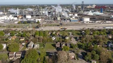 Homes in a neighborhood located beside Marathon Petroleum’s Detroit refinery in the most polluted zip code in Michigan. 

Pollution comes from the refinery and other nearby industries, and from the 10,000 trucks that pass daily on Interstate 75.