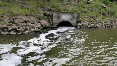 Water flowing into the Lower Minnesota River from a St. Cloud Wastewater Treatment Facility (WWTF) outfall pipe in August 2021.