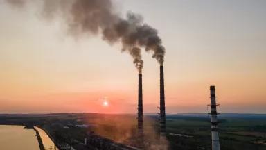 Emissions rising from smokestacks at a coal-fired power plant.