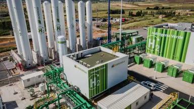 Hydrogen storage tanks and an electricity substation and electrolyzer at a solar-powered green hydrogen plant in Puertollano, Spain, during the final stages of construction on May 19, 2022. 

The new plant will be Europe's largest production site for green hydrogen for industrial use. 