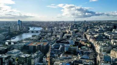 An aerial view of Central London, the Thames River, and Southwark in London, England.
