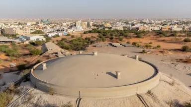 A water reservoir at the Aftout Essahli project in Nouakchott, Mauritania. The water supply initiative is financed by the African Development Bank and recycles and transports treated water from the Senegal River to the capital city and surrounding rural areas to alleviate severe drinking water shortages amid prolonged droughts and erratic rainfall.
