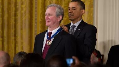 President Barack Obama presents the Presidential Medal of Freedom to NRDC co-founder John H. Adams. Photo credit: Anthony Clark/NRDC