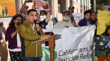 Angel Garcia from Californians for Pesticide Reform (CPR) explaining the impacts of pesticides on communities in California.