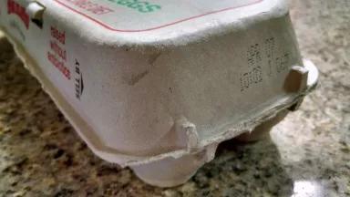 Image of egg carton with "Sell by" date label