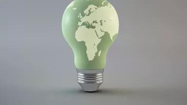 Drawing of a light bulb with a map of the earth