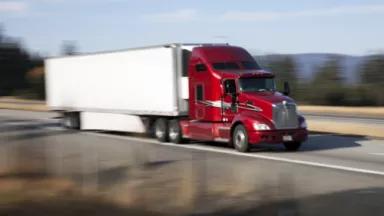 Thumbnail image for truck iStock_18400545-Truck on the highway.png