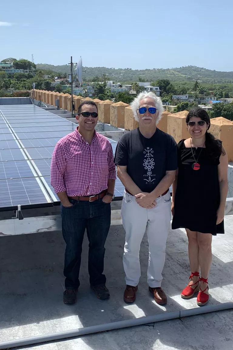 NRDC’s Luis Martinez (left), Radio Vieques station manager and community leader Robert Rabin (center), Resilient Power Puerto Rico cofounder Cristina Roig (right) in Puerto Rico, where NRDC assisted in installing a solar grid on the island of Vieques